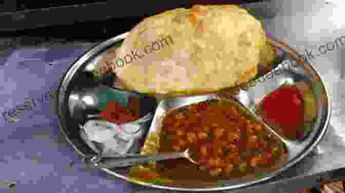 A Spicy Chole Bhature Street Food Dish From Delhi, India. 101 Indian Street Food Dishes To Eat Before You Die