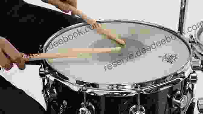 Drummer Demonstrating Various Drumming Rudiments Drumming Glossary: Ways To Improve Your Drumming: Drumming Exercise Equipment