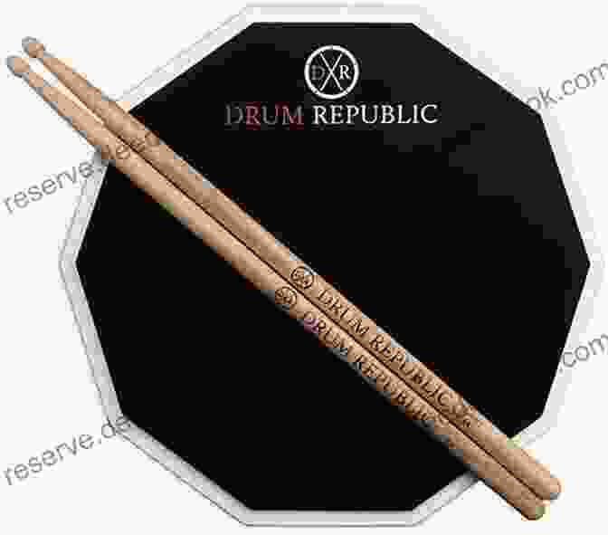 Drummer Practicing With Drumsticks And A Drum Pad Drumming Glossary: Ways To Improve Your Drumming: Drumming Exercise Equipment