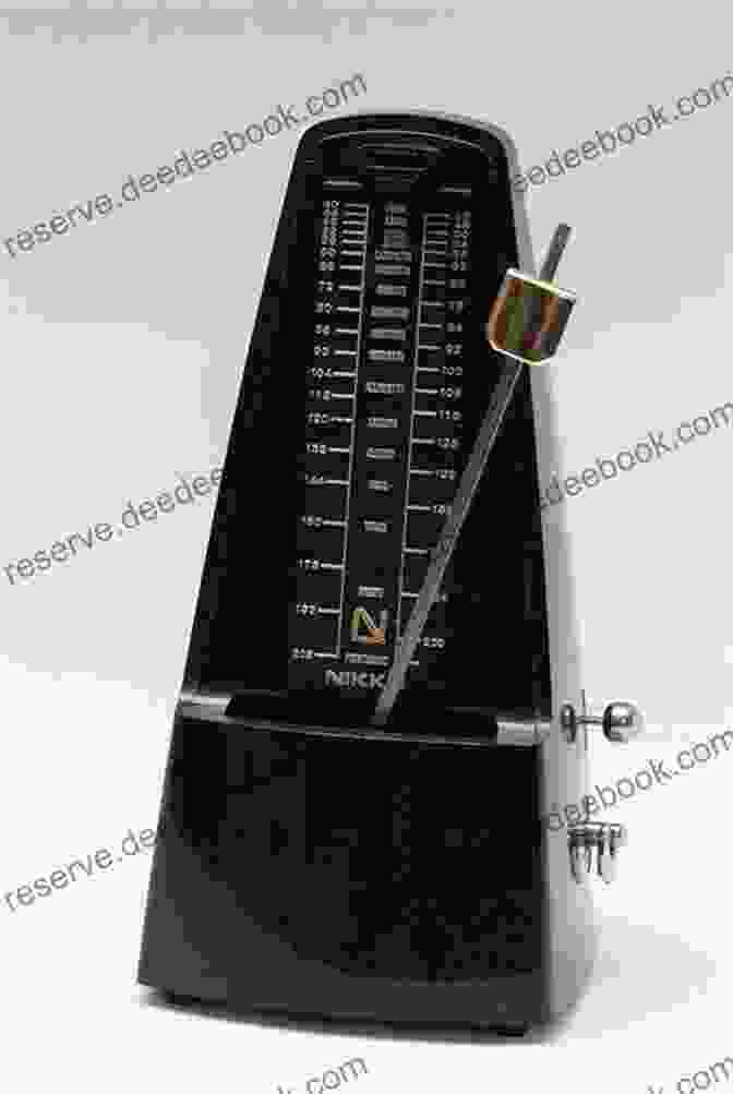 Drummer Using A Metronome To Practice Rhythm Drumming Glossary: Ways To Improve Your Drumming: Drumming Exercise Equipment