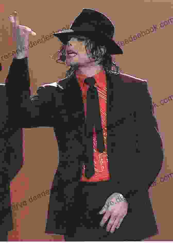 Michael Jackson Performing On Stage In A White Suit And Black Fedora THE MAN MICHAEL JOE JACKSON: August 1958 June 2009