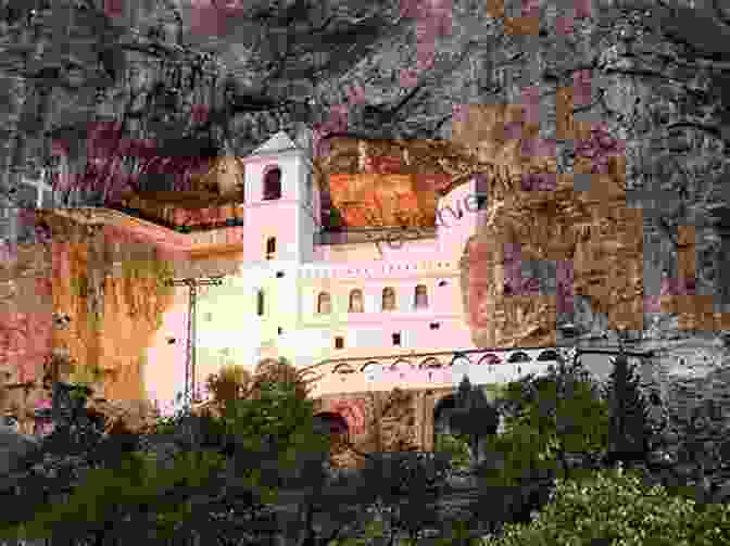 Ostrog Monastery, A Pilgrimage Site Perched On A Sheer Cliff Face, Offering Panoramic Views Of The Surroundings. Postcards: A Visual Escape Through Montenegro
